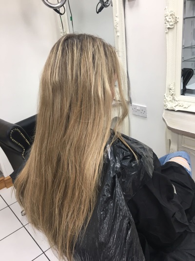 Long Blonde Hair with Brown Roots